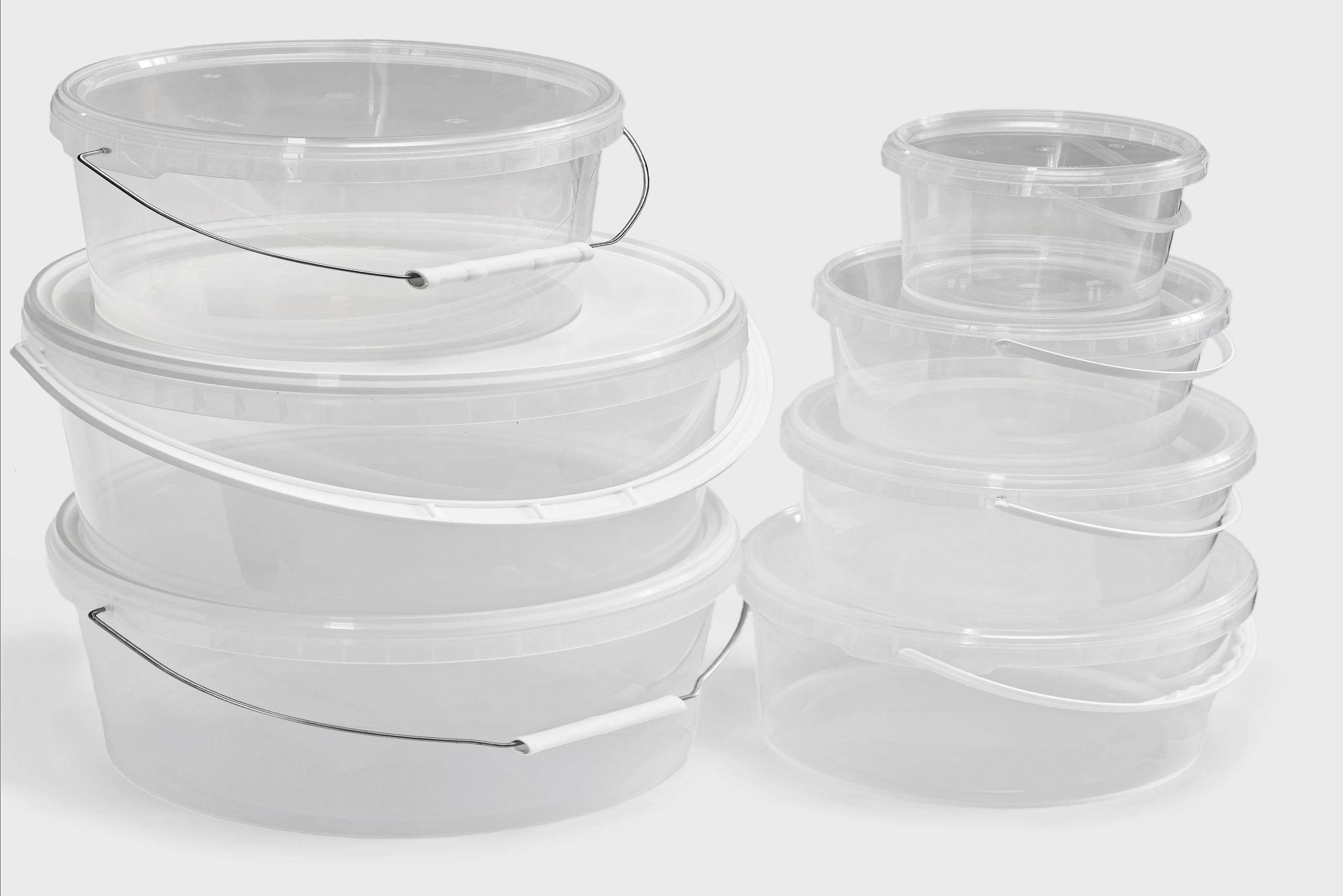 See through plastic buckets isolated on the white background